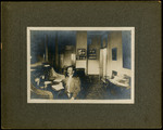 Photograph of Louis E. Holden Sitting at a Desk