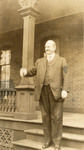 Photograph of President J. Campbell White on Stairs, Waving