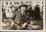 Photograph of Charles F. Wishart, Outside, Sitting Down With a Cane by Unknown
